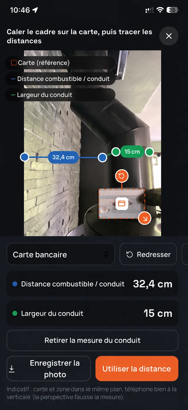 L'outil de mesure par photo : distances tracées sur la photo d'un conduit avec une carte bancaire en référence